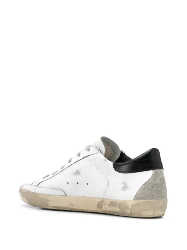 Golden Goose Super-Star sportcipők fekete sarokpánttal és fém szegecsekkel